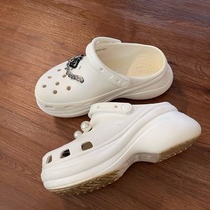 Platform Crocs with charms. Size 8